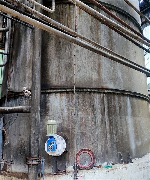 FMT side entry mixer fitted near the base of a large process tank
